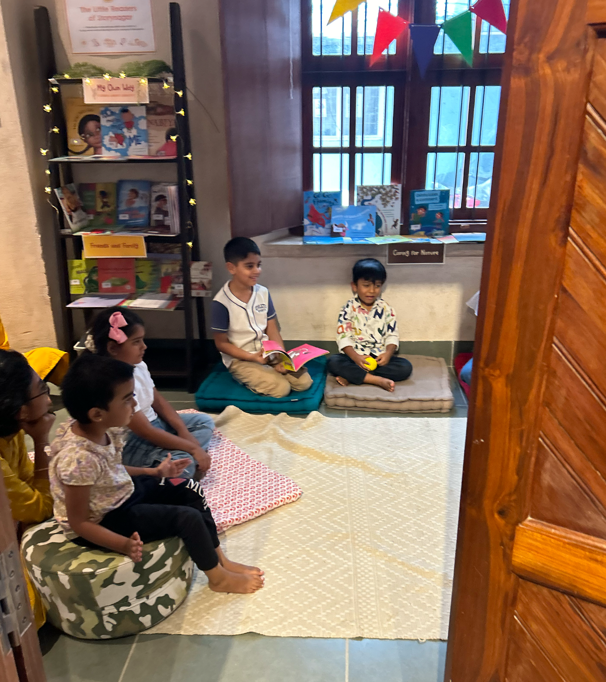 Children reading together at the Little Readers of Storynagar corner